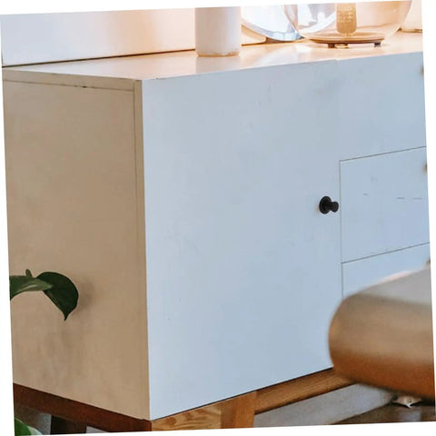Sleek cabinet with hidden pop up drawer pull handle for cabinets and doors, unobtrusive finger pull design, modern home interior.