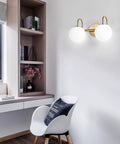 Modern Bathroom Vanity Light Fixtures With Two Lights Brushed Brass Finish And Milk White Globe Glass Shade Wall Bar Sconce