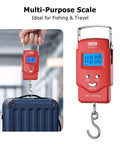 Digital Luggage Scale 110 Lb With Tape And Stainless Steel Hook Ultra Accurate For Travel And Fishing A Super Handy Weighing Tool For Baggage Or Gear Everyday Carry. Red digital luggage scale with stainless steel hook weighing a suitcase.