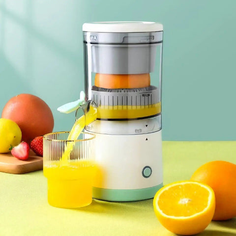 Handheld Citrus Juicer Electric For Oranges Lemons Limes USB Rechargeable Portable Squeezer Wireless Masticating Press with juice flowing into glass.