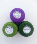 Three skeins of FabricOrg cotton-like thread in purple and green colors from Embroidery Starter Kit With Cotton Threads Three Skeins Punch Needle Hoop Stencils And Heat Erasable Pen For Modern Floral Design Beginners Ideal For DIY Crafters Looking To Level Up Their Floral Embroidery Projects