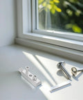 Rock Solid 2 Set Silver Screw Tap Extractor Kit For Tough Broken Bolt Removal And Damaged Thread Repair Without Ruining Surrounding Areas On Pipes And Fasteners, silver extractor on window sill