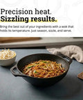 Mini Cast Iron Wok For Stir Fry Lovers With Naturally Seasoned Finish and stir-fry noodles, dual loop handles, 9 inch size.