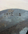 Close-up of Dodge Taper Lock Bushing 1 Inch Bore Inner Diameter 1 Inch Outer Diameter 2-1/2 Inch Thick 1-1/4 Inch Surface Rust