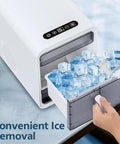 Compact Nugget Ice Maker With Self Cleaning Countertop Design Produces Crisp Chewable Ice Quick As A Wink For Home Bars And Rv Trailers No Fuss Operation And Slick Pull Out Drawer Keeps Your Setup Sweet showing ice removal.