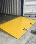 Heavy Duty Steel Shipping Container Ramp For Trucks And Forklifts 16000 Pound Diamond Plate Bridge in yellow for easy loading.