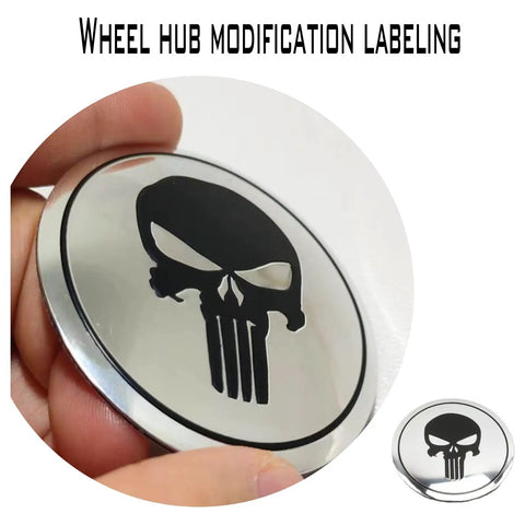 Four Piece Heavy Duty Aluminum Hub Center Cap Decals Featuring Dope Tusked Skull Art For Clean Wheel Cover Stickers That Slap Onto Most Standard Rims Smoothly, close-up of black skull design.