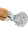 Close-up of wood handle and metal wheel of Spur Wire Embedder Tool For Beehives Beekeeping Gear To Secure Foundation Wax In Hive Frames