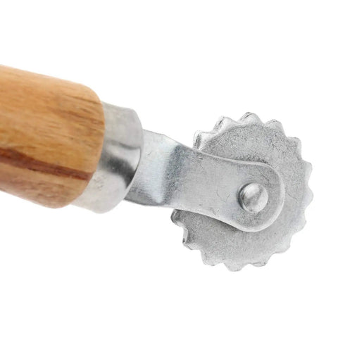 Close-up of wood handle and metal wheel of Spur Wire Embedder Tool For Beehives Beekeeping Gear To Secure Foundation Wax In Hive Frames