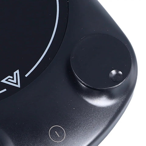 Close-up of the control interface of a Fast Heating Electric Mug Warmer Featuring Four Adjustable Heat Settings And Smart Auto Shutoff.