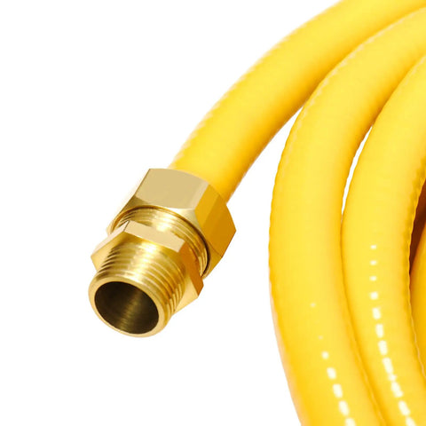 Close-up of 3/4 inch brass pipe fitting hex nipple attached to yellow hose for quick connects in water, gas, oil, and air tool systems.