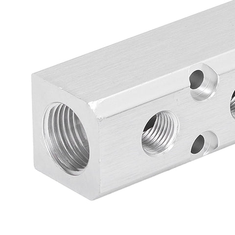 Close-up of Heavy Duty Aluminum Pneumatic Manifold Block With G1/2 Inlet And G1/4 Outlets 30x30mm Air Distribution Hub for automation gear.