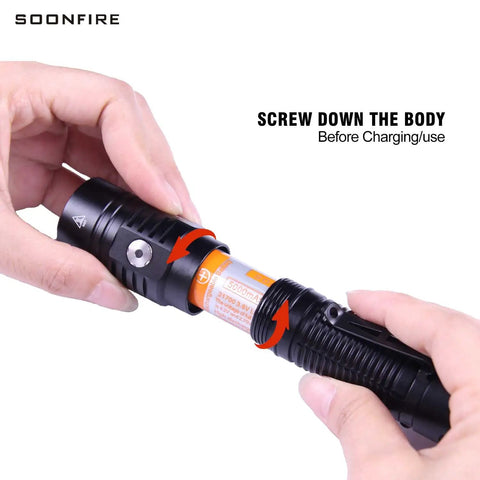 Hands showing battery installation in 2000 Lumen LED Flashlight With Preinstalled Rechargeable Battery Ultra Compact Light