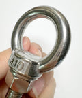 Heavy Duty M10 Shoulder Eye Bolt 304 Stainless Steel 4 Inch Lifting Ring held by hand for secure lifting and rigging tasks.