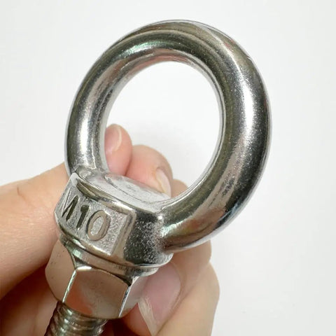 Heavy Duty M10 Shoulder Eye Bolt 304 Stainless Steel 4 Inch Lifting Ring held by hand for secure lifting and rigging tasks.