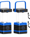 Two blue Go-To Solar Rechargeable Lanterns for Camping and Hiking, 1000 lumen LED lights, with USB-C charging cables, side view.