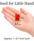 Kid Approved 110 Pieces Translucent Counting Bears With Heavy Duty Plastic Jar Color Sorter, red bear in hand for size reference.