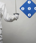 Fencer using Five Target Fencing Practice Pad For Foil And Epee Wall Mounted Striking Target Gear for training precision.