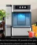 Large Capacity Countertop Ice Maker With No Fuss Self Cleaning And Three Liter Detachable Tank, producing nugget ice for drinks.