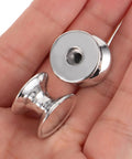 Close-up of 10 Pack Aluminum Alloy Cabinet Handles Drawer Knobs Metal Wardrobe Pulls Single Hole Silver Finish in hand