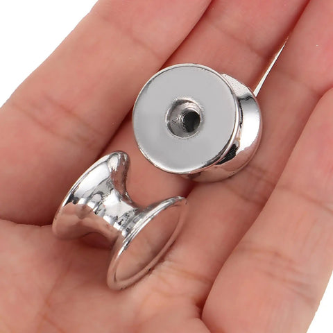 Close-up of 10 Pack Aluminum Alloy Cabinet Handles Drawer Knobs Metal Wardrobe Pulls Single Hole Silver Finish in hand