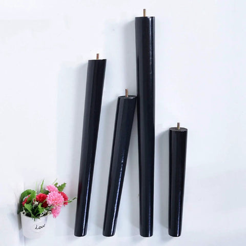 Heavy Duty Rubber Wood Furniture Legs 4 Pack, Sleek Black Tapered Cabinet Feet, 70 cm tall threaded supports displayed on wall.