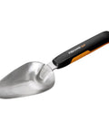 Xact Garden Hand Trowel with sharp edges, rust-resistant stainless steel head, softgrip handle, designed for precise digging and weeding.
