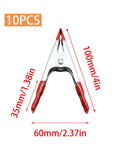 Rock Solid Four Inch Metal Spring Clamps With Grippy Rubber Tips, 4in clamp with metal body and red grips for secure woodworking.