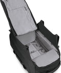 Open interior view of Osprey Sojourn Shuttle 30/100L wheeled duffel, black exterior, grey lining with packing straps