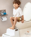 Child sitting on toilet with Rustic Farmhouse Toilet Paper Holder With Shelf For Wipes Wall Mounted Brown Wood