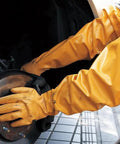 Person wearing Double Nitrile Coated Full Arm Chemical Resistant Safety Glove With Cotton Poly Liner, working on machinery.