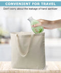 Hand holding a filled silicone bottle above an open tote bag, demonstrating convenient travel use with no leaks or spills.