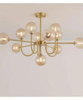Nordic Minimalist Magic Bean LED Pendant Lamp French Glass Ball U-Shaped Chandelier with 12 frosted glass bulbs in gold finish.