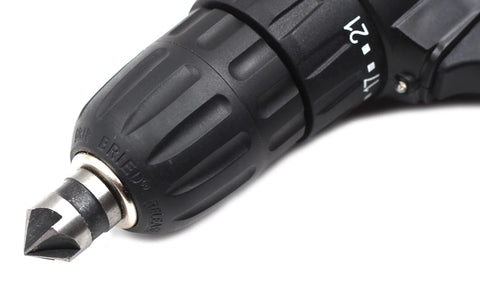Countersink drill bit, metal, 5-flute, in a black drill chuck with conical tip.