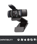 Straight Fire Top Tier HD Webcam Featuring Quick Release Privacy Shutters 1080P Full HD Auto Focus Stream Or Call Crystal Clear Stereo Mic Plug In Ready For PC Laptop mounted on a stand.