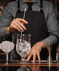 Bartender using Two Piece 12 Inch Stainless Steel Bar Spoon Set For Cocktails with Mirror Polished 18 8 Handle in mixing glass