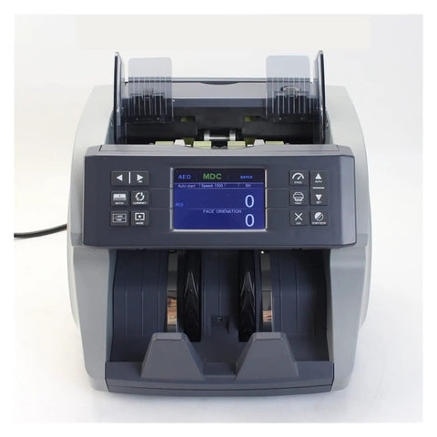 Heavy Duty Smart Bill Counter Machine With Uv Mg Ir Fake Cash Detector Mix Value Multi Currency Auto Denomination Check And Double Cis Sensor front view with digital display.
