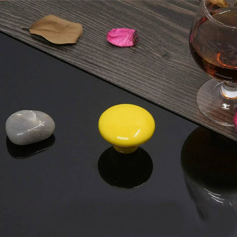 Absolute Game Changer Ceramic Mushroom Drawer Knobs And Cabinet Pull Handles Killer Aesthetic For Dressers And Kitchen Cupboards Rugged 15 Piece Set With Screws, yellow ceramic mushroom knob on dark surface.