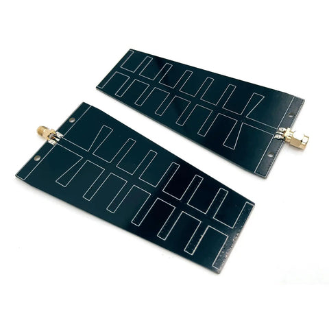 Image of 12dBi 2.4GHz High-Gain WiFi Directional Yagi Antenna For Drones, USB Adapters, Routers, And Cameras with SMA connector.