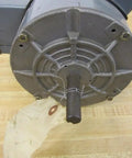 Front view of 3/4 HP Electric Motor 1725 RPM 115/230V 60 Hz SCS Type Code L 40C Ambient showing shaft and durable construction