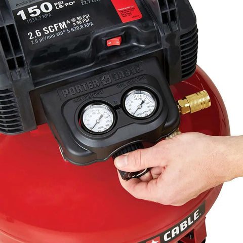 Close-up of the Workhorse Pancake Air Compressor With Six Gallon Oil Free Tank 150 PSI Max Pressure pressure dials and controls.