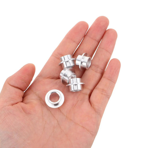 Hand holding silver Rad High Quality Pro Grade Aluminum Skateboard Bearing Spacers Hardware Kit 30 Pcs self-centering axle spacers