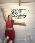 Person standing in front of salon wall displaying Dope Fully Customizable 3D Laser Cut Acrylic Sign For Wall Display, Personalized Logo Sign For Salon Spa Studio Office, Durable 3mm Acrylic Branding Plaque For Brand Visibility And Modern Decor.