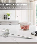 KAMaster 304 Stainless Steel Pork Puller Drill Attachment on kitchen counter, used for shredding meat quickly and efficiently.