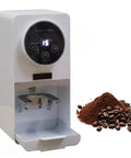 Top Shelf Automatic Coffee Tamper For 58mm Portafilters Featuring Quick Time Settings And Smart Sensor Activator, white unit with digital display.