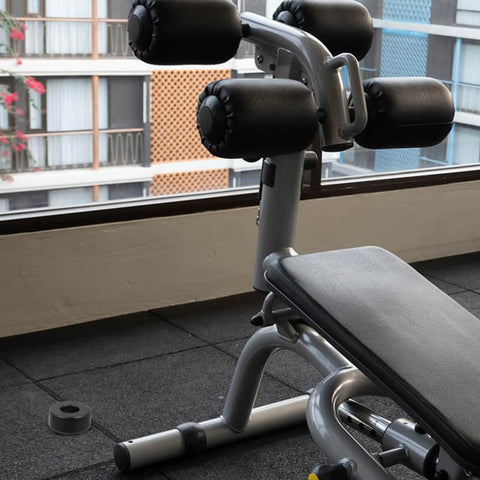 Home gym machine with 4 Pack Shock Absorber Rubber Ring Pads for Fitness Equipment Non Slip Wear Resistant Feet Bumpers to reduce vibration.