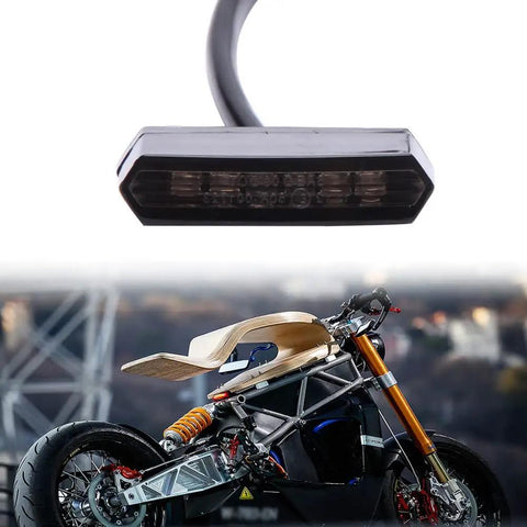 Dope Mini Motorcycle Tail Light LED Blinker License Plate Light Universal Black Auxiliary Indicator For Electric Bikes Bobbers Cruisers ATVs Dirt Bikes Quads And More Easy Install With 3M Adhesive No Drilling. black LED tail light with wire and mounted on custom motorcycle