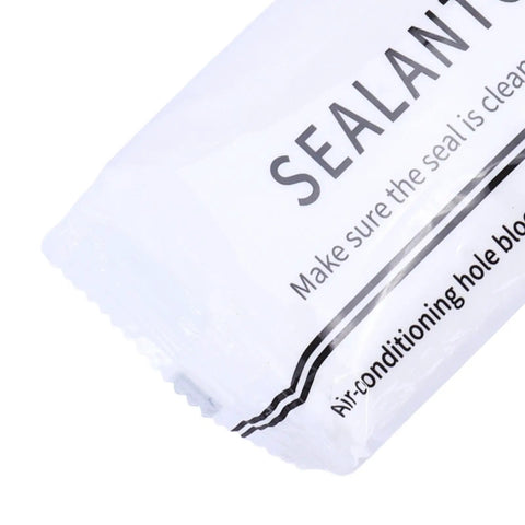 Close-up of DIY Sealing Putty For Wall Holes And Cracks Waterproof Duct Mastic Sealant Paste packaging showing partial text.