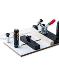 Pro Grade Rail Coping Sled For Router Tables And Jigs, Delivers Precise Cabinet Door Joints And Drawer Front Cuts, End Grain Blowout Prevention, Adjustable Clamps For Stable, Cleaner Routing On Rail And Style Doors, shown from above with visible clamps and adjustable fence.