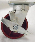 Heavy Duty Five Inch Swivel Casters With Kingpinless Design And Ductile Steel Wheels Delivering Smooth Rolling Action And Rock Solid Load Rating Brake Set Of Four profile view showing brake mechanism and steel wheel.